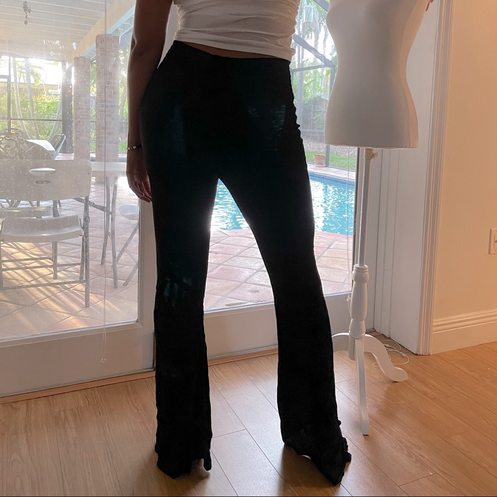 Black pants with elastic waistband and flares